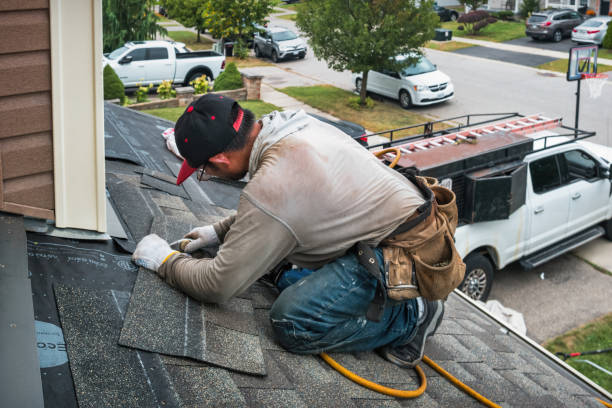 Professional Roofing technician working in Kansas, OH